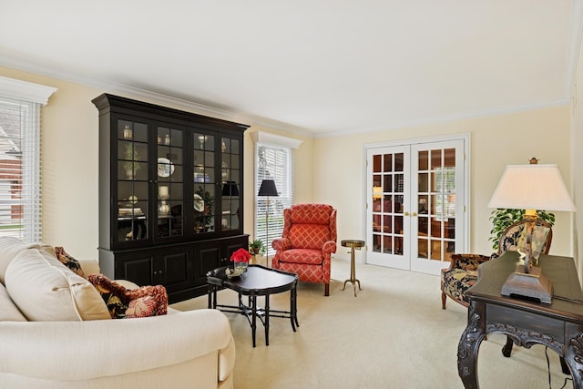 1219 N Lakeview Ct, Palatine, IL 60067 - living area with french doors, crown molding, plenty of natural light, and carpet floors