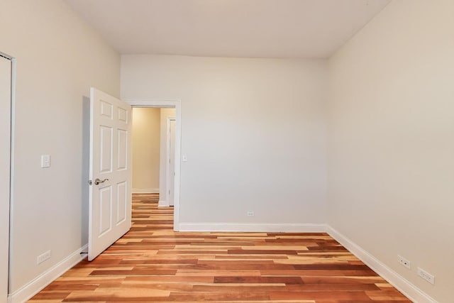 1634 N Wolcott Ave Unit 3, Chicago, IL 60622 - empty room with baseboards and light wood-type flooring