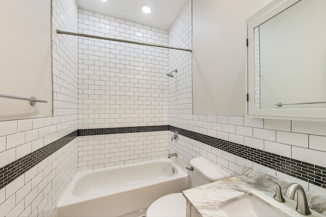 1634 N Wolcott Ave Unit 3, Chicago, IL 60622 - full bathroom with tile walls, washtub / shower combination, vanity, and recessed lighting