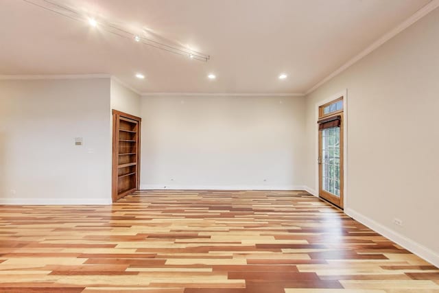 1634 N Wolcott Ave Unit 3, Chicago, IL 60622 - empty room featuring recessed lighting, light wood-type flooring, crown molding, and built in shelves