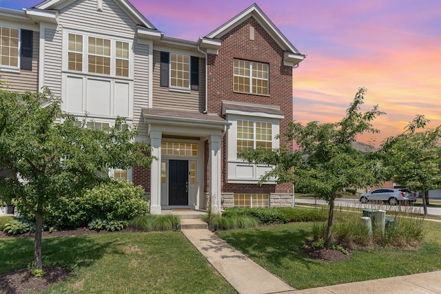 15373 Sheffield Square Pkwy, Orland Park, IL 60462 - view of front facade with brick siding and a front lawn