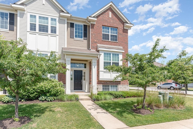 15373 Sheffield Square Pkwy, Orland Park, IL 60462 - townhome / multi-family property with a front lawn and brick siding