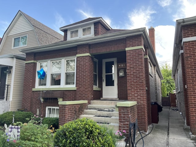 4721 W Warwick Ave, Chicago, IL 60641 - view of front of property with brick siding and a shingled roof