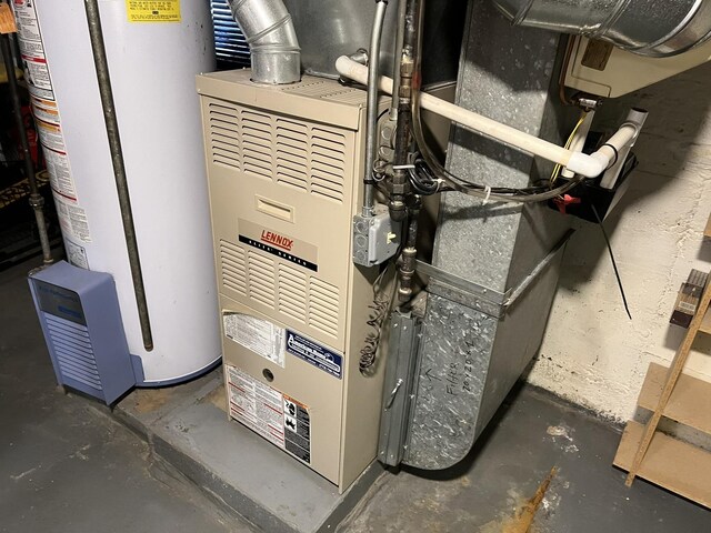 4721 W Warwick Ave, Chicago, IL 60641 - utility room featuring water heater