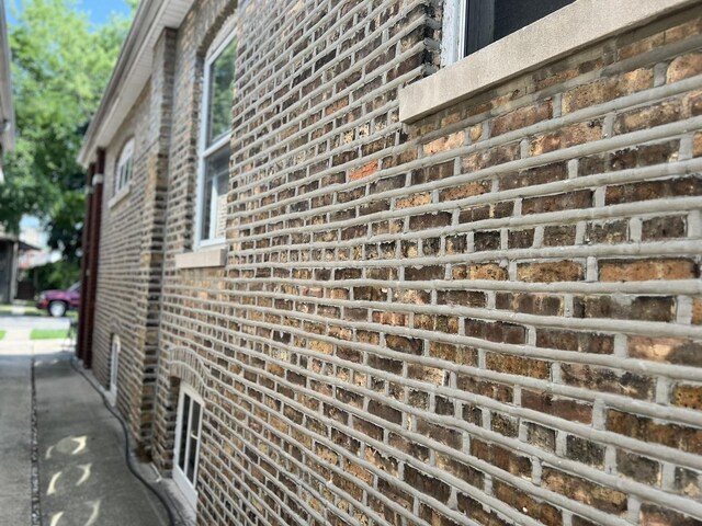 4721 W Warwick Ave, Chicago, IL 60641 - view of side of property featuring brick siding