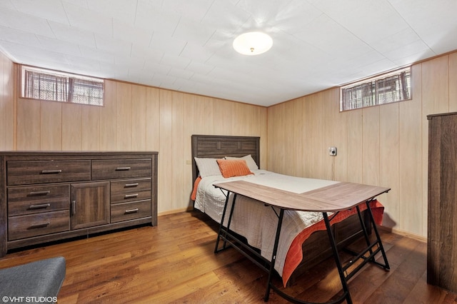 8301 N Waukegan Rd, Niles, IL 60714 - bedroom featuring wood walls and wood finished floors