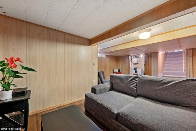 8301 N Waukegan Rd, Niles, IL 60714 - living area with wood walls, wood finished floors, and stairs