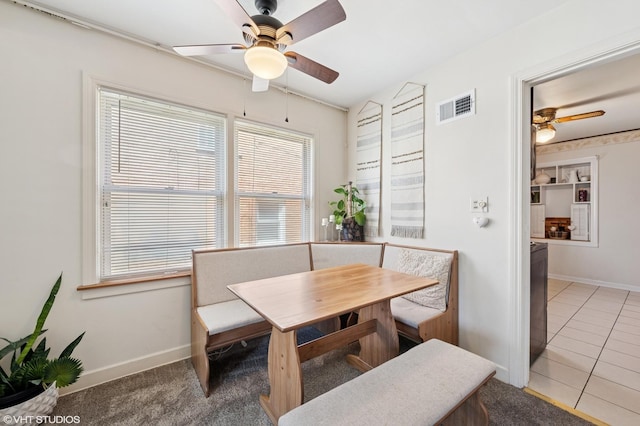 8301 N Waukegan Rd, Niles, IL 60714 - dining space with a ceiling fan and light tile patterned flooring
