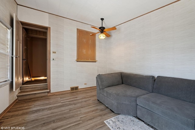 8301 N Waukegan Rd, Niles, IL 60714 - living area with wood finished floors and ceiling fan