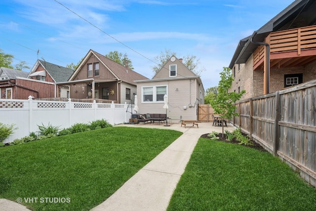 5747 W Grace St, Chicago, IL 60634 - back of house featuring a patio area and a fenced backyard