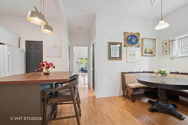 5747 W Grace St, Chicago, IL 60634 - dining room with plenty of natural light and light wood-type flooring