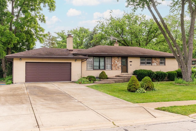 525 Bunning Dr, Downers Grove, IL 60516 - ranch-style house with an attached garage, a chimney, brick siding, and a front lawn