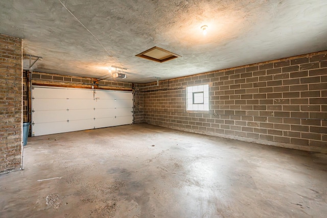 525 Bunning Dr, Downers Grove, IL 60516 - garage with a garage door opener and concrete block wall