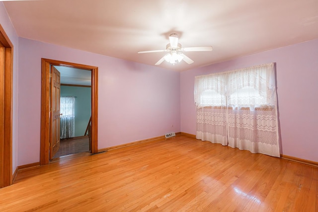 525 Bunning Dr, Downers Grove, IL 60516 - unfurnished room with light wood-style floors and ceiling fan