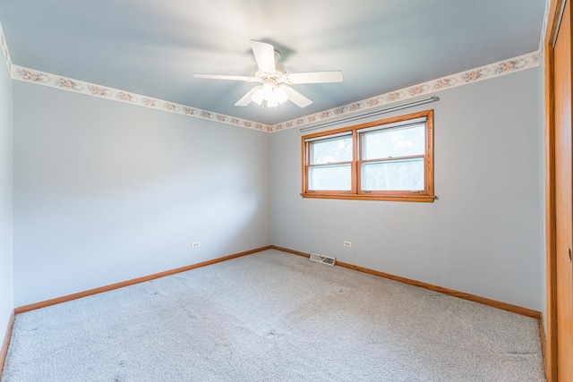 525 Bunning Dr, Downers Grove, IL 60516 - carpeted empty room with baseboards and ceiling fan