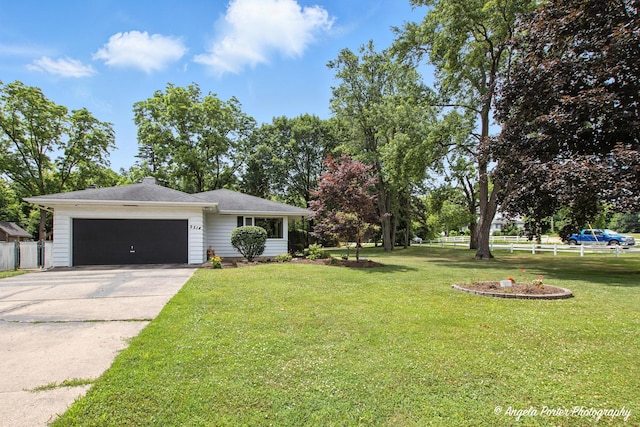 2514 Cuhlman Rd, Mchenry, IL 60051 - view of front of house featuring driveway, an attached garage, and a chimney