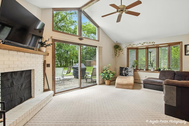 2514 Cuhlman Rd, Mchenry, IL 60051 - living area with high vaulted ceiling, ceiling fan, carpet floors, a brick fireplace, and a baseboard radiator