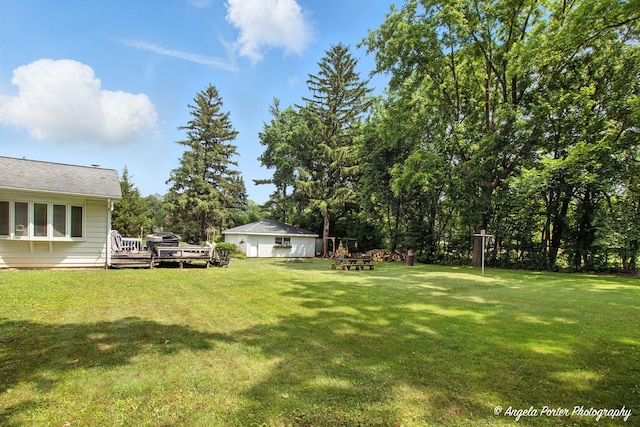 2514 Cuhlman Rd, Mchenry, IL 60051 - view of grassy yard featuring a wooden deck