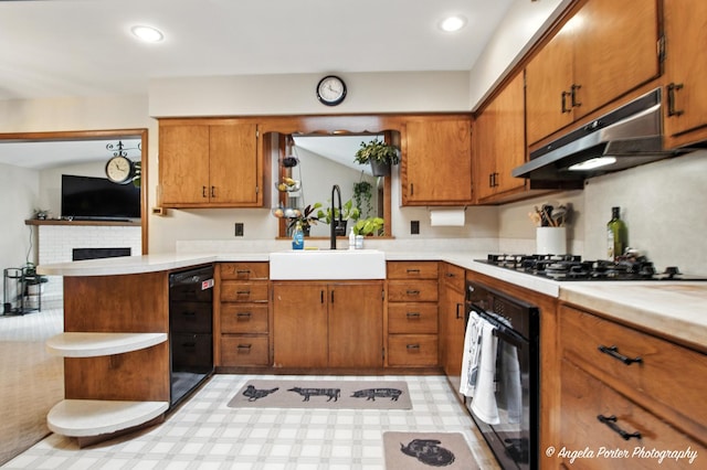 2514 Cuhlman Rd, Mchenry, IL 60051 - kitchen with black appliances, under cabinet range hood, brown cabinets, light countertops, and recessed lighting