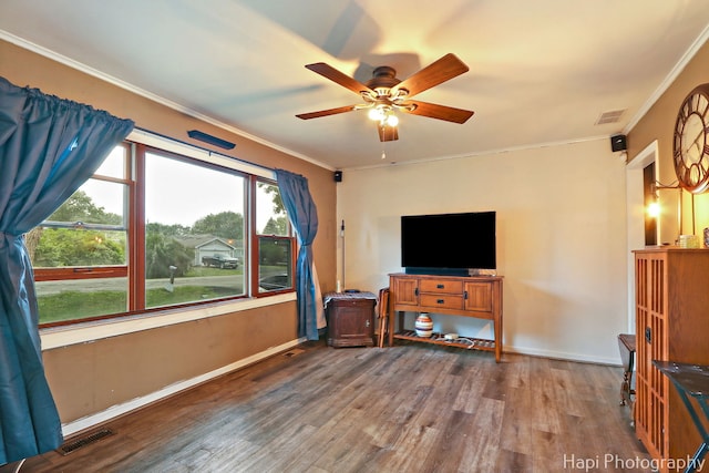 1912 Oak Dr, Mchenry, IL 60050 - unfurnished living room featuring crown molding, ceiling fan, and wood finished floors
