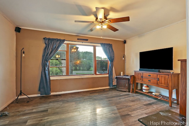 1912 Oak Dr, Mchenry, IL 60050 - unfurnished living room featuring a ceiling fan, wood finished floors, and crown molding