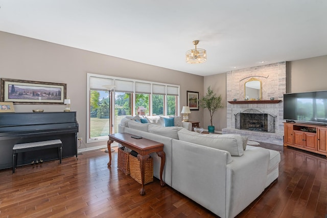 17642 Crystal Lake Dr, Homer Glen, IL 60491 - living room with a fireplace, dark wood-style flooring, a chandelier, and recessed lighting