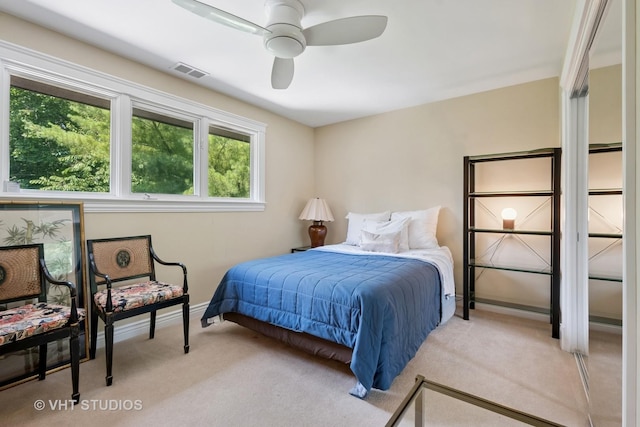 36 Logan Ter, Golf, IL 60029 - bedroom with light colored carpet and ceiling fan