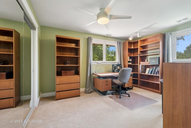 36 Logan Ter, Golf, IL 60029 - home office featuring a ceiling fan, light colored carpet, and rail lighting