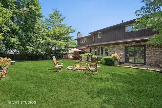 36 Logan Ter, Golf, IL 60029 - view of yard featuring a fire pit