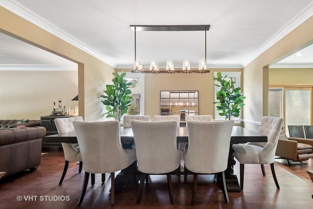 36 Logan Ter, Golf, IL 60029 - dining space featuring ornamental molding and wood finished floors