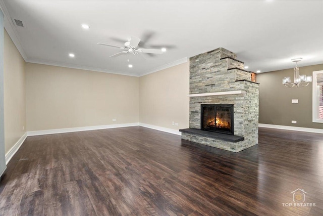 1702 Winthrop Ln, Schaumburg, IL 60193 - unfurnished living room with a ceiling fan, a chandelier, dark wood-type flooring, a stone fireplace, and ornamental molding