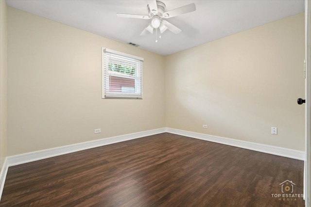 1702 Winthrop Ln, Schaumburg, IL 60193 - empty room featuring dark wood-style floors and ceiling fan
