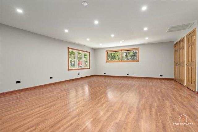 1702 Winthrop Ln, Schaumburg, IL 60193 - unfurnished bedroom with light wood-style floors and recessed lighting