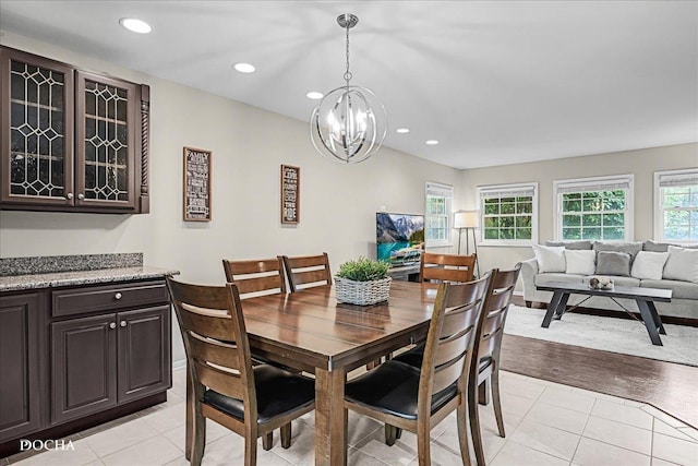 425 W Gartner Rd, Naperville, IL 60540 - dining space featuring a chandelier, light tile patterned flooring, and recessed lighting