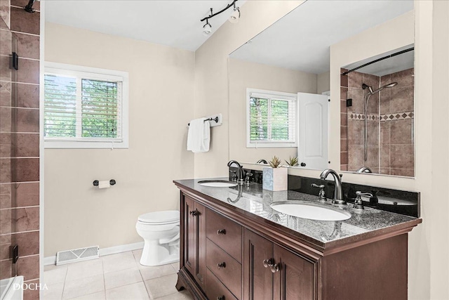 425 W Gartner Rd, Naperville, IL 60540 - bathroom with double vanity, tile patterned flooring, and a tile shower