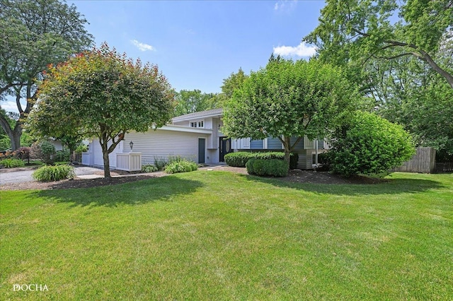425 W Gartner Rd, Naperville, IL 60540 - view of yard featuring an attached garage and driveway