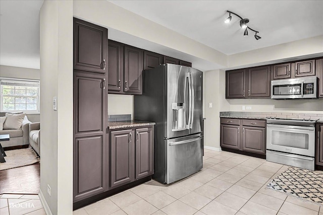 425 W Gartner Rd, Naperville, IL 60540 - kitchen with appliances with stainless steel finishes, light tile patterned flooring, and dark brown cabinets