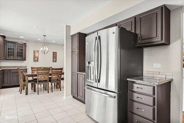 425 W Gartner Rd, Naperville, IL 60540 - kitchen with stainless steel fridge with ice dispenser, light tile patterned floors, a chandelier, dark brown cabinetry, and recessed lighting