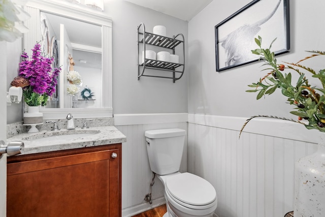 641 Sundance Dr, Bolingbrook, IL 60440 - half bath featuring vanity and a wainscoted wall