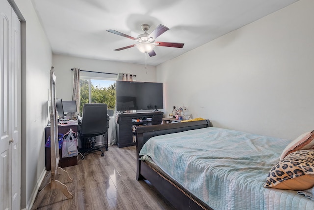 641 Sundance Dr, Bolingbrook, IL 60440 - bedroom with wood finished floors, ceiling fan, and a desk