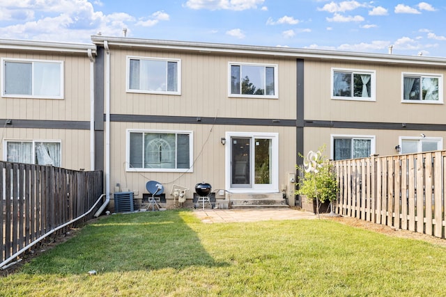 641 Sundance Dr, Bolingbrook, IL 60440 - rear view of house featuring a fenced backyard, a patio, and entry steps