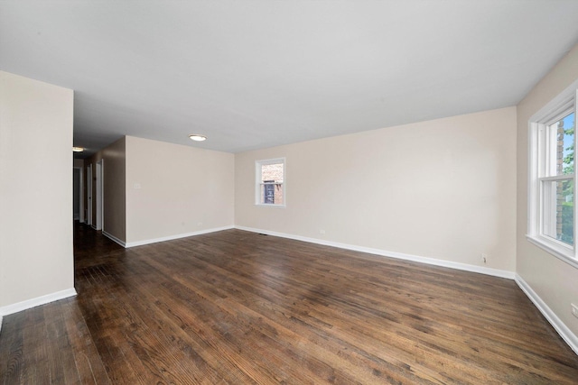 476 W 17th St, Chicago Heights, IL 60411 - empty room featuring dark wood-type flooring