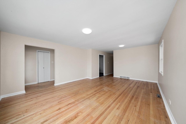 476 W 17th St, Chicago Heights, IL 60411 - spare room featuring light wood finished floors and baseboards
