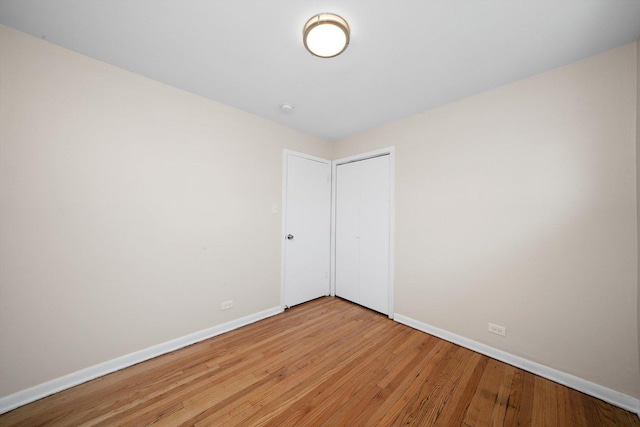476 W 17th St, Chicago Heights, IL 60411 - spare room with baseboards and light wood-style flooring
