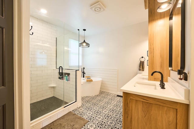671 Teal Ct, Dekalb, IL 60115 - full bath with a shower stall, a soaking tub, double vanity, and tile patterned flooring
