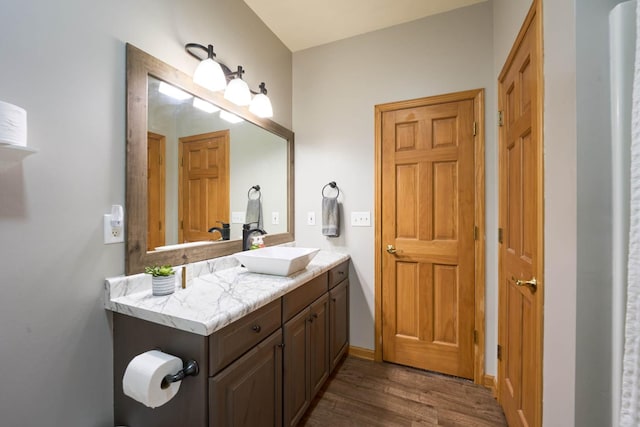 671 Teal Ct, Dekalb, IL 60115 - bathroom featuring wood finished floors and vanity