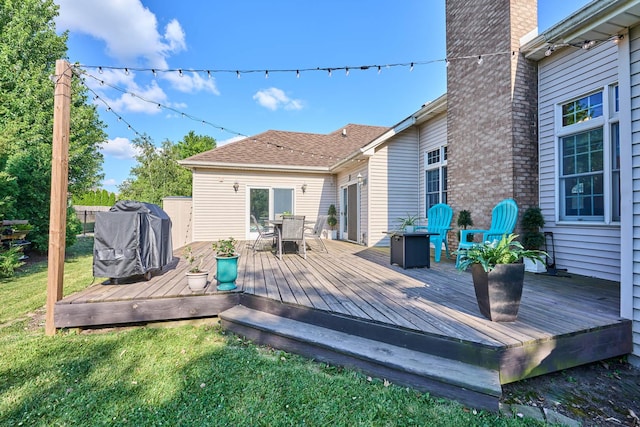 671 Teal Ct, Dekalb, IL 60115 - wooden deck featuring outdoor dining space, a lawn, and a grill