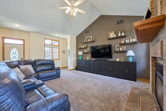 671 Teal Ct, Dekalb, IL 60115 - living area with a fireplace, a ceiling fan, carpet floors, lofted ceiling, and recessed lighting