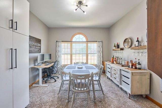 671 Teal Ct, Dekalb, IL 60115 - dining area featuring light colored carpet, a bar, and a desk