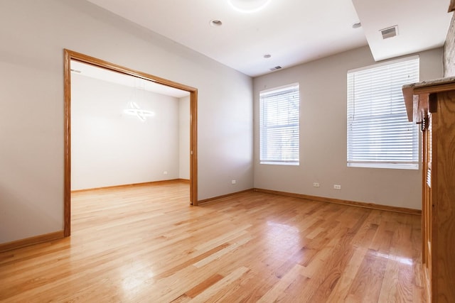 4137 S Prairie Ave Unit 1S, Chicago, IL 60653 - spare room with light wood-style flooring and baseboards